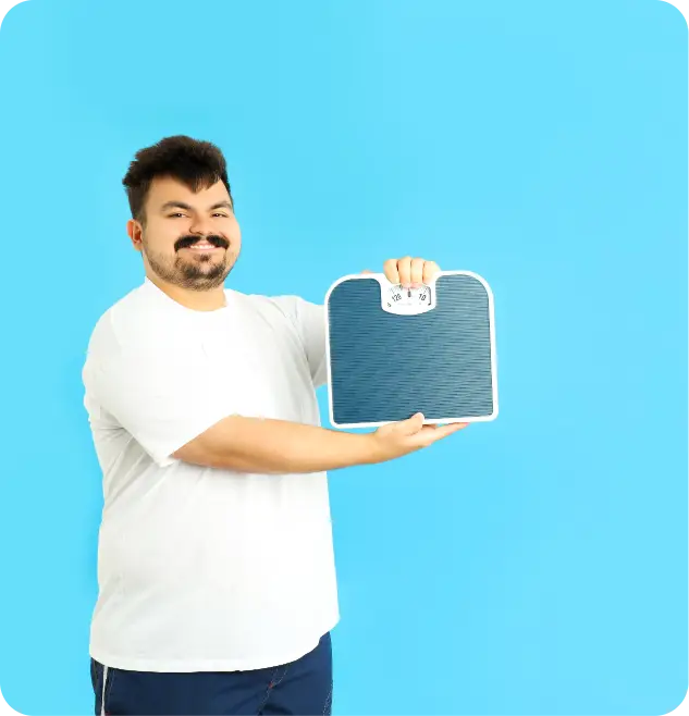 A man holding a weighing scale